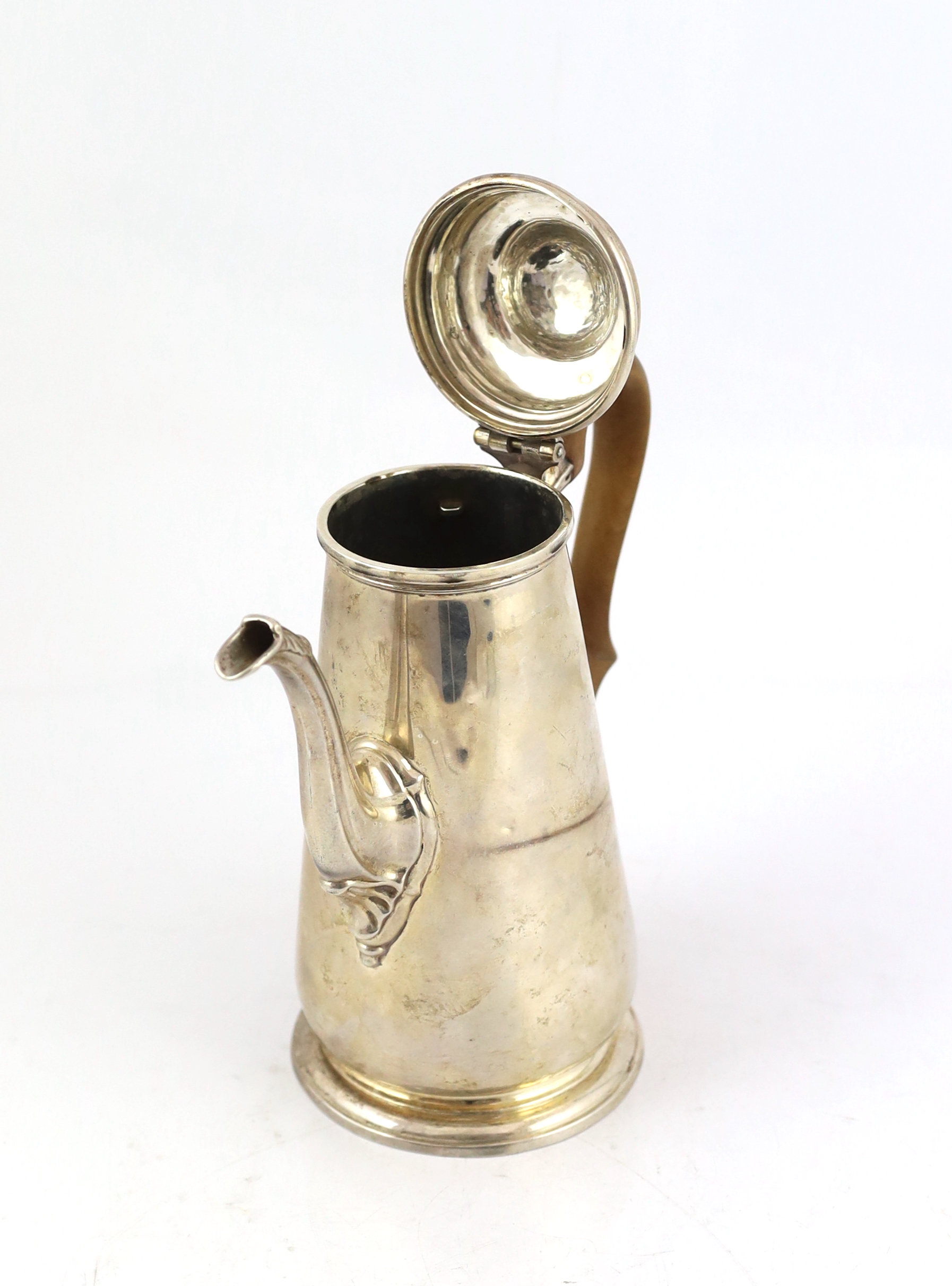 A George II silver coffee pot and hinged cover with turned finial, William Williams I